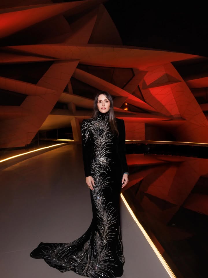 May be an image of gown, dress and text