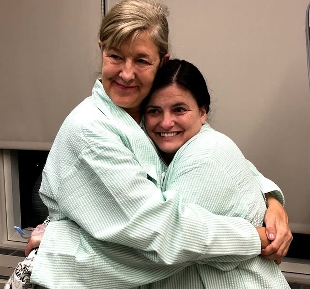 May be an image of one or more people, people smiling, hospital and text