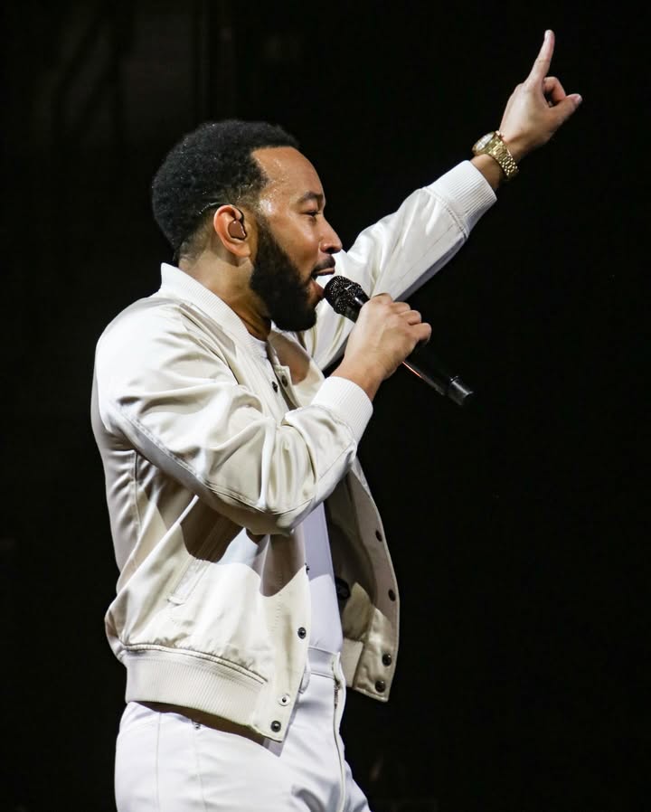 May be an image of microphone, concert and text