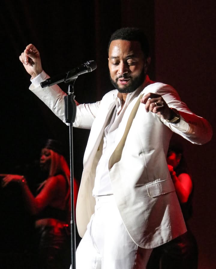 May be an image of microphone, concert and text