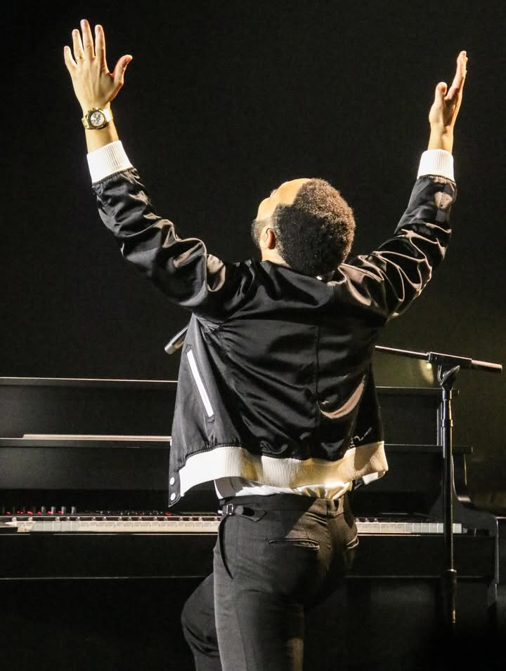 May be an image of piano, saxophone, microphone, concert and text