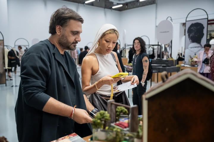 May be an image of one or more people and text