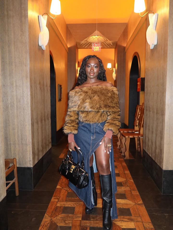 May be an image of one or more people, makeup, fur, miniskirt, turtleneck and text