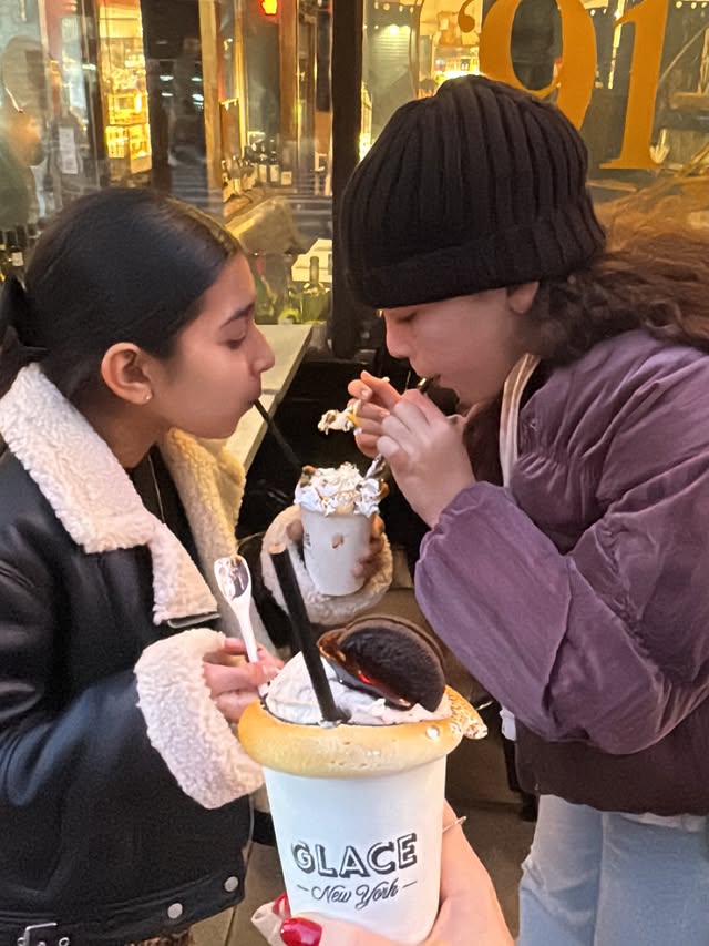 May be an image of one or more people, gelato, drink, whipped cream and text that says 'GLAGE Mew Voh- ፃሚ'