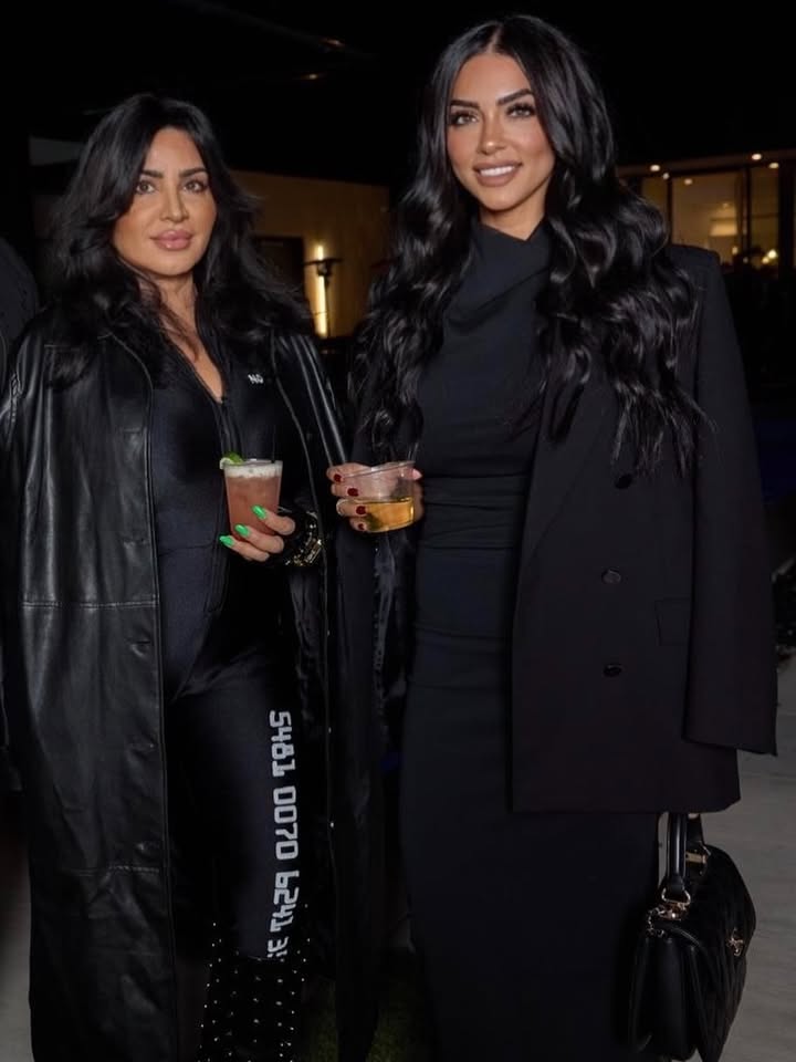 May be an image of one or more people, makeup, overcoat and text