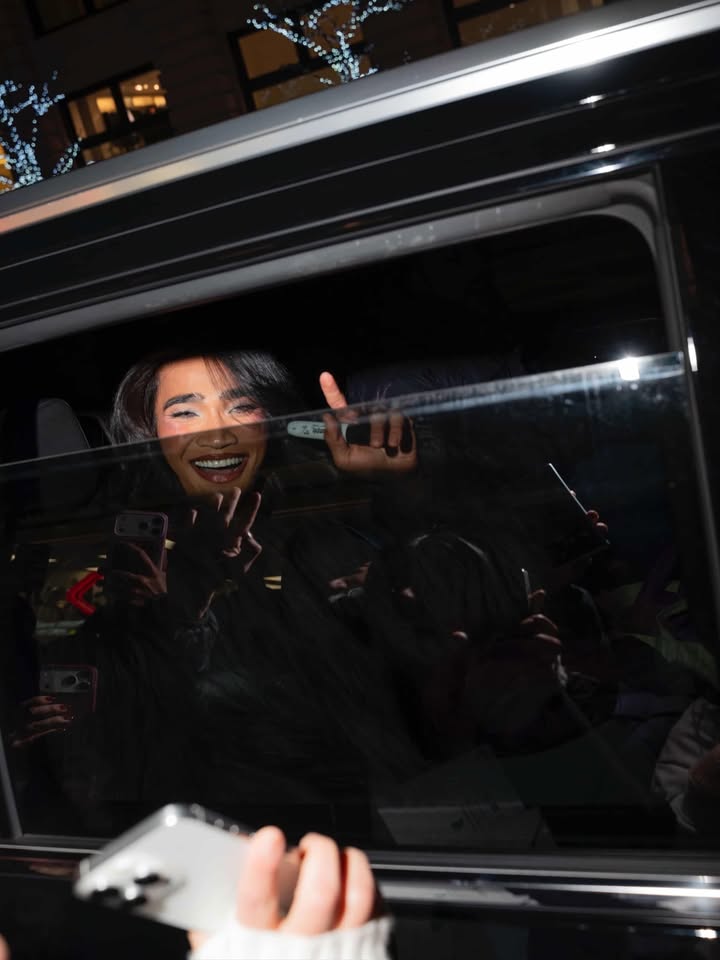 May be an image of phone, bus, limousine and text