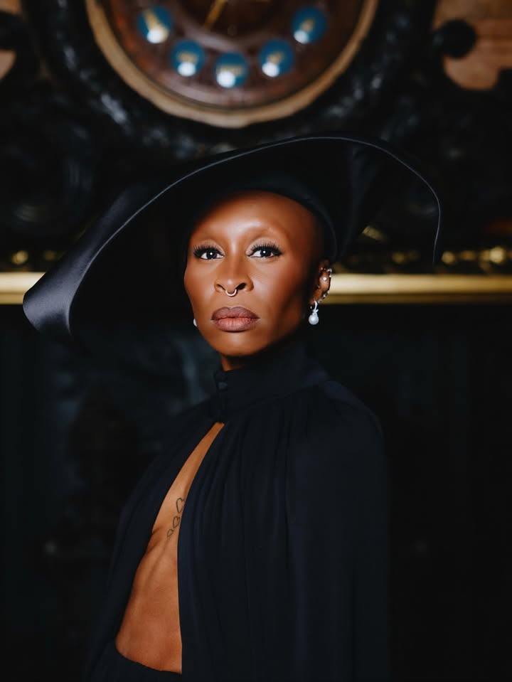 May be an image of one or more people, makeup, hat, headscarf, beret, bowler hat and text