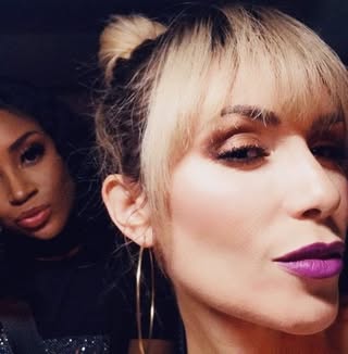 May be a selfie of one or more people, hair, lipstick, makeup and top