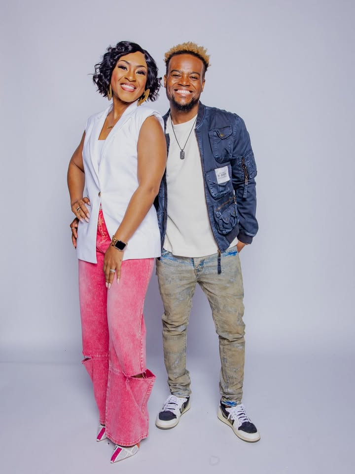 May be an image of one or more people, people smiling, people standing and text