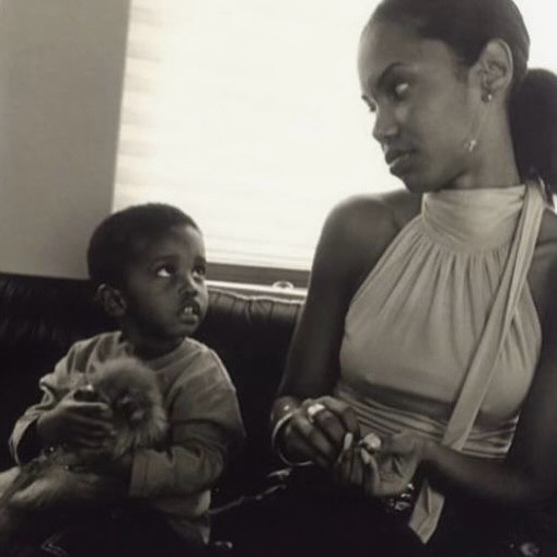 May be a black-and-white image of baby and text