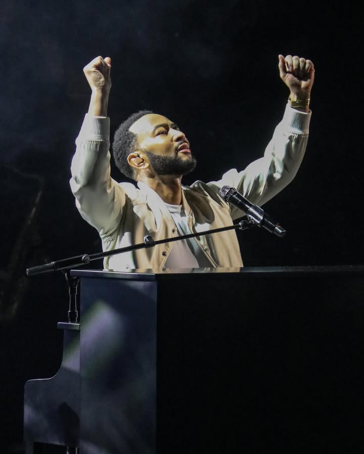 May be an image of piano, microphone, concert and text