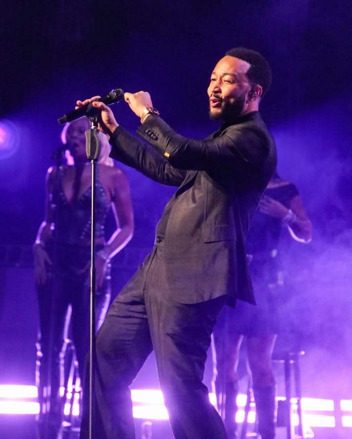 May be an image of microphone, concert and text