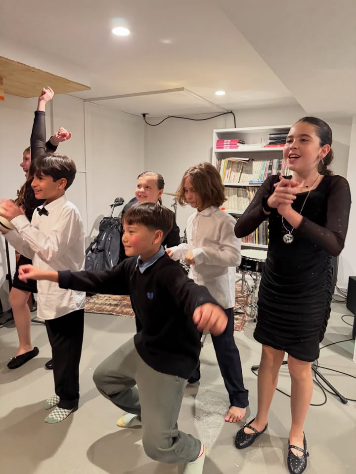 May be an image of dancing, violin and text