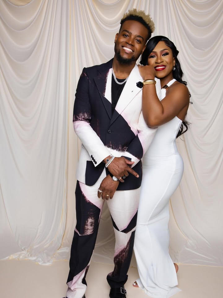 May be an image of one or more people, people smiling, bowtie, gown, dinner jacket, wedding and text