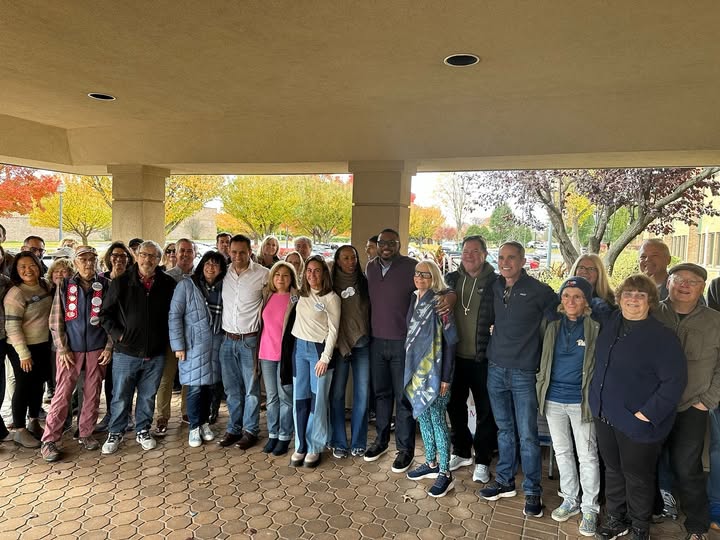 May be an image of smiling and standing