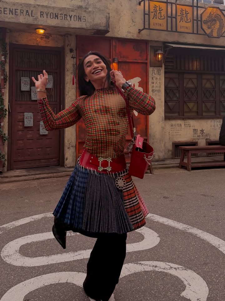 May be an image of tambourine, parasol, kilt and miniskirt