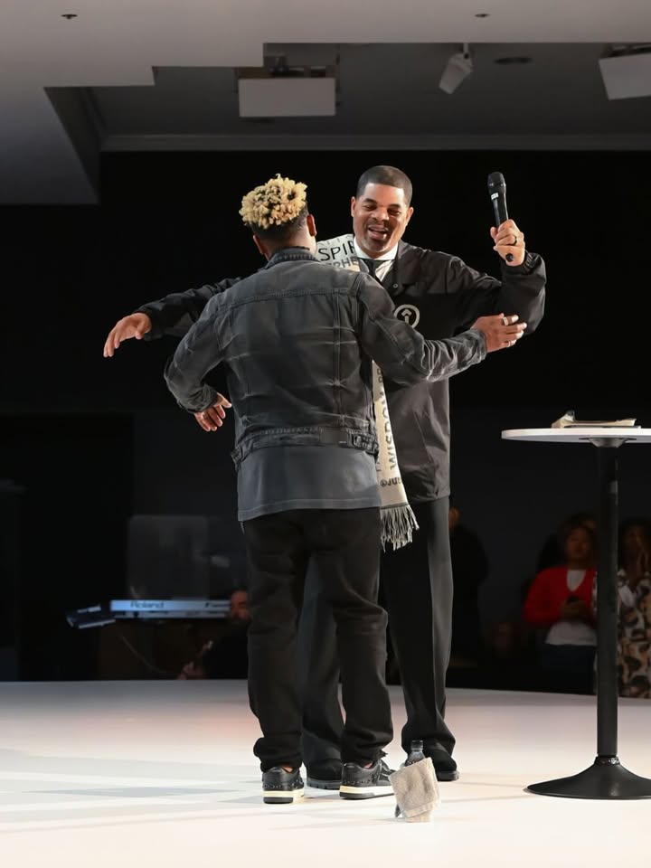 May be an image of standing and microphone