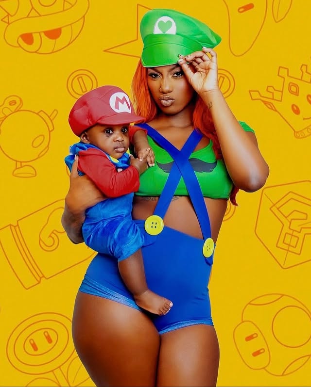 May be an image of baby, diaper, headscarf and costume