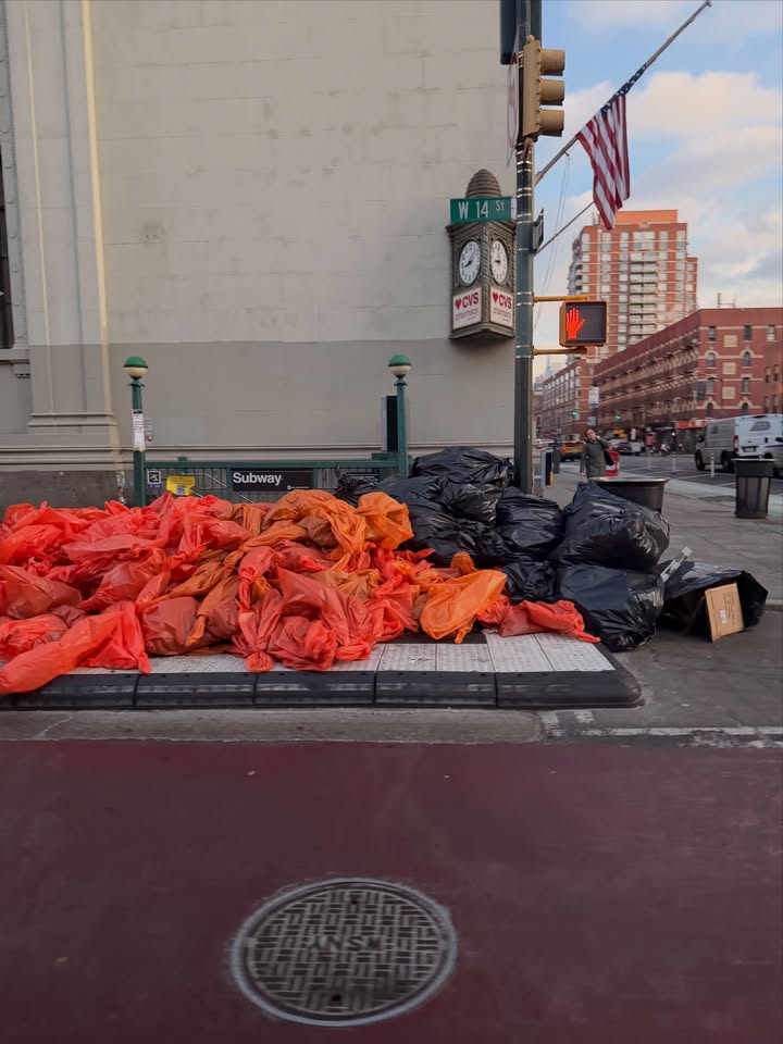 May be an image of garbage, plastic bag, manhole, shopping cart, curb and text