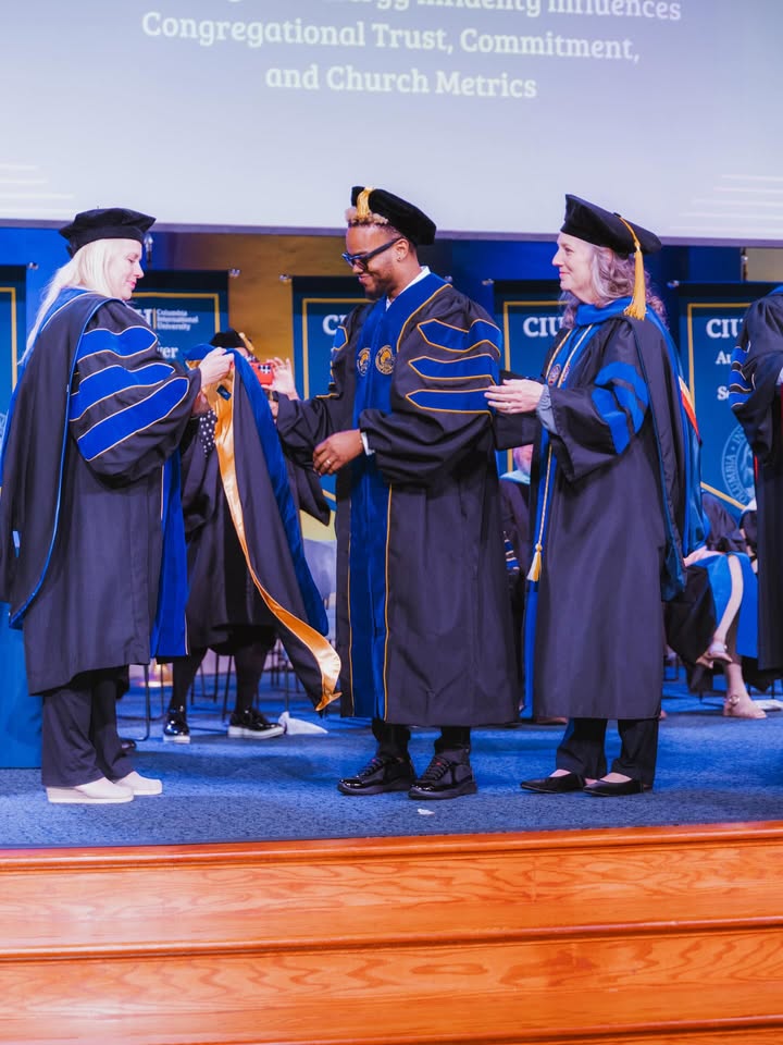 May be an image of standing, microphone and text that says 'Congregational Trust, Commitment, minuences and Church Metrics иaKй ar er CIU CИ΄ Ar'