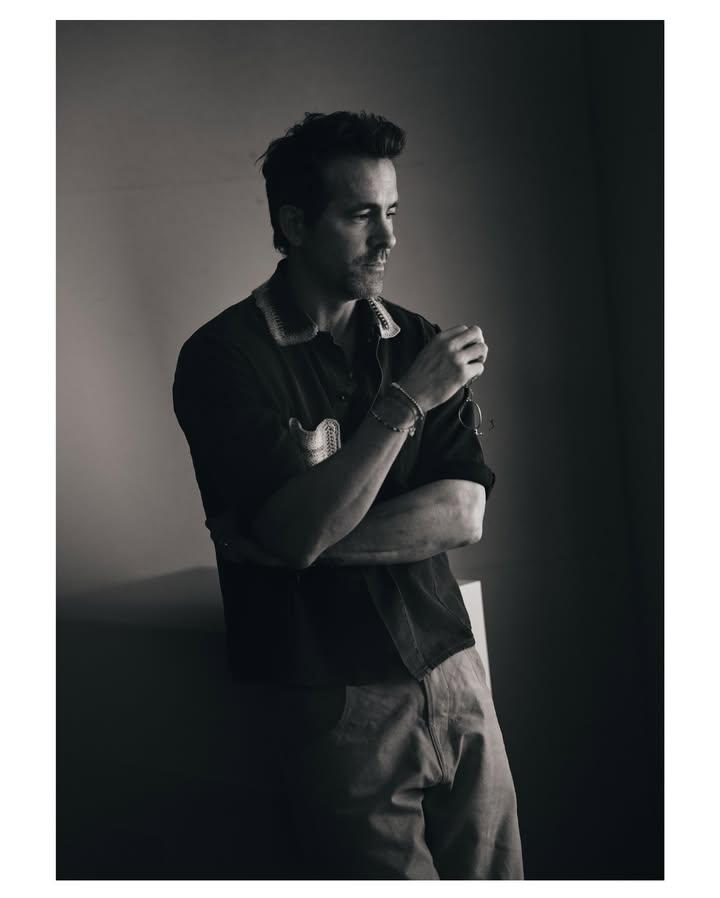 May be a black-and-white image of one or more people, beard and text