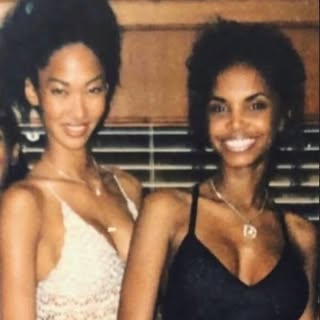 May be an image of one or more people, makeup and text