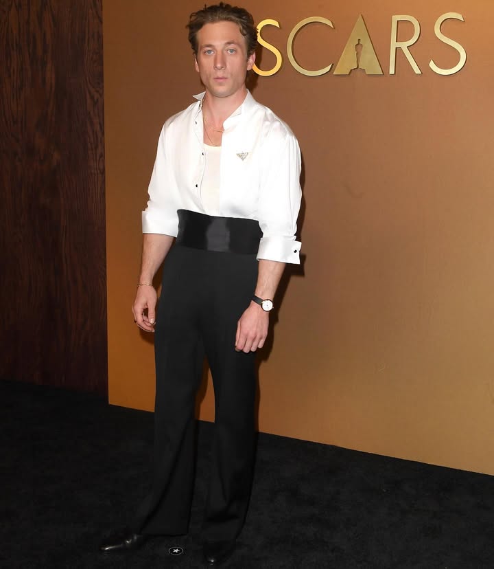 May be an image of standing, belt, dinner jacket and text that says 'SCARS'