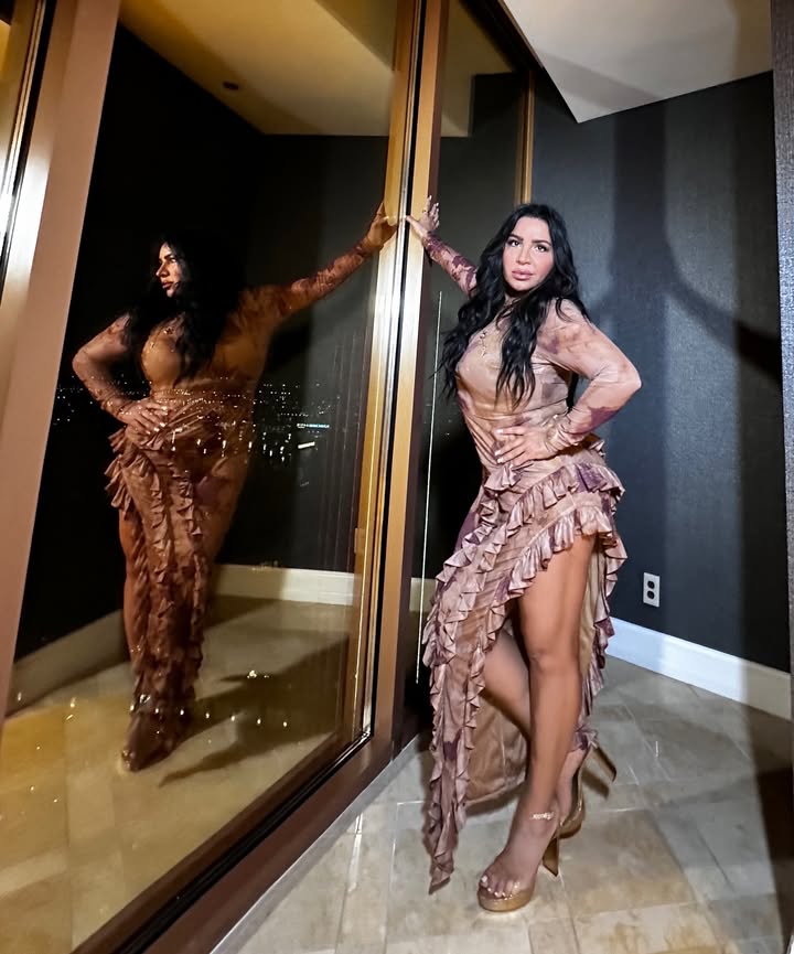 May be an image of gown, dress and text