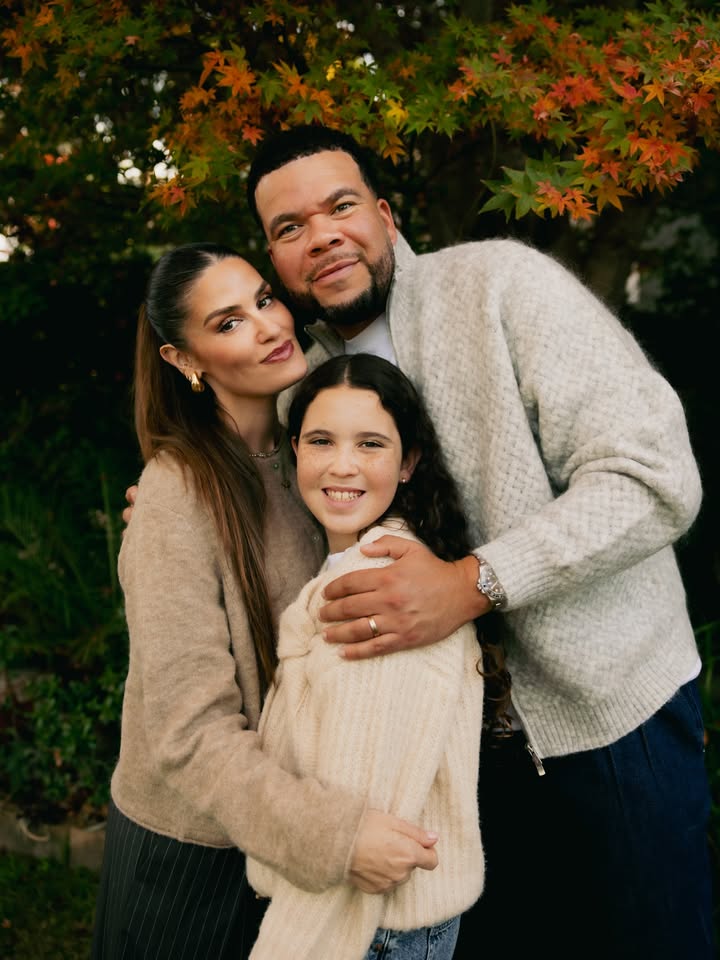 May be an image of child, smiling, tree, park and text