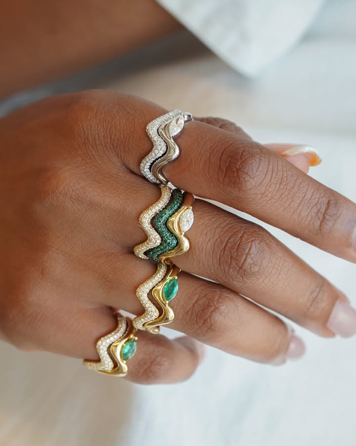 May be an image of ring, bangle and text