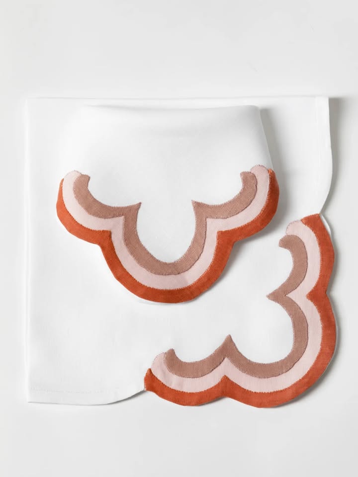 May be an image of napkin, placemat and text