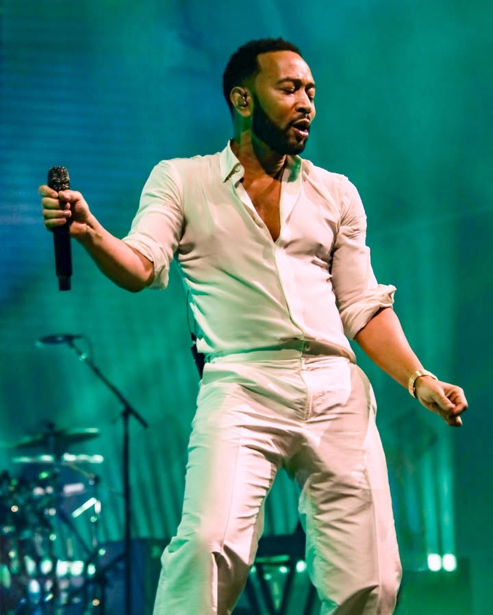 May be an image of microphone, concert and text