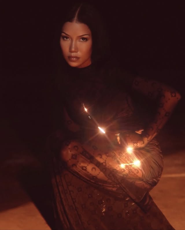 May be an image of one or more people, makeup, dress, gown and text