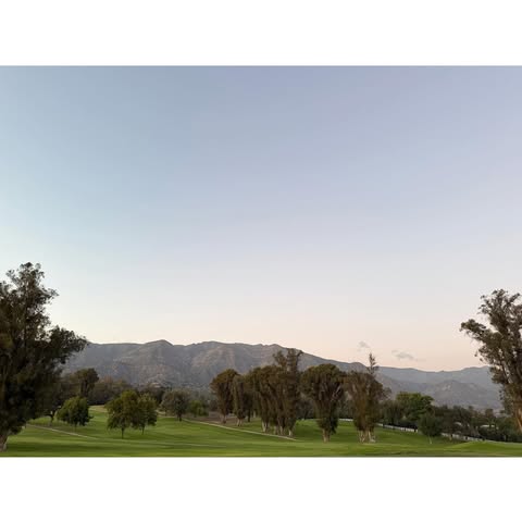 May be an image of golf, golf course, twilight, park and text