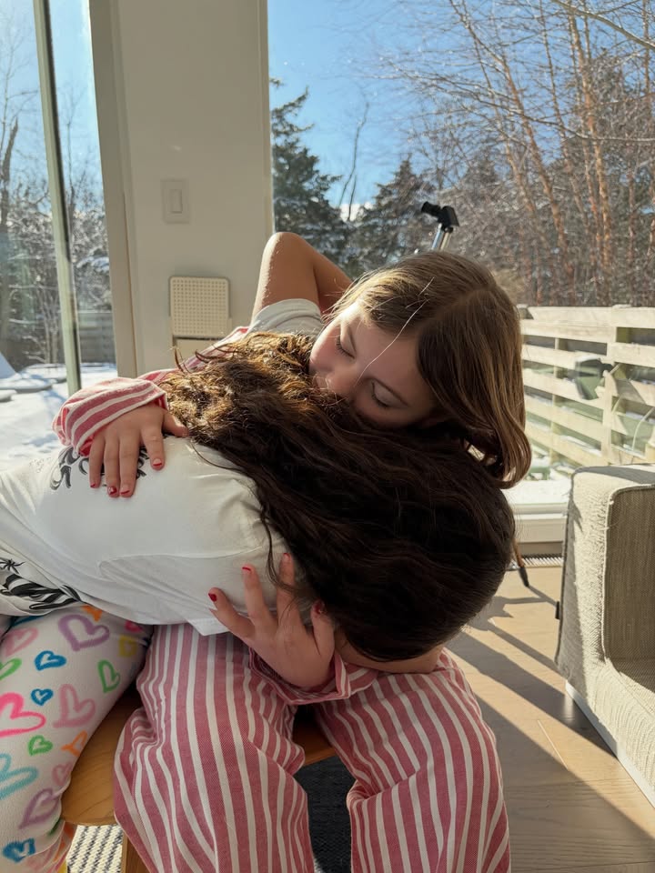 May be an image of child, sleepwear, beanbag chair and text