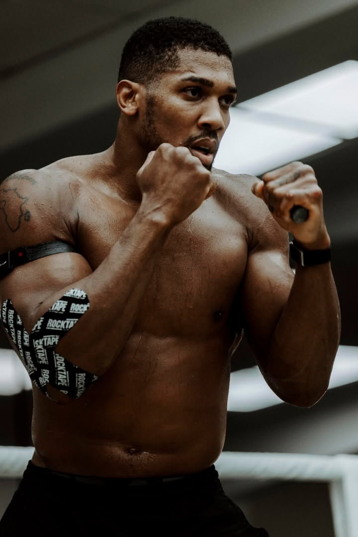 May be an image of ‎sportswear, punching bag and ‎text that says '‎KIAK BOCK ح ANEROCK 源 ROCK ROCKTA' TAPE APE BOжη CKTAP CRIA TAPE ကြီး OCKTAP TAP ROS‎'‎‎