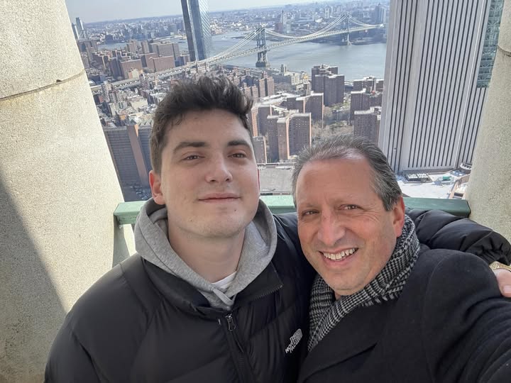 May be a selfie of skyscraper and text