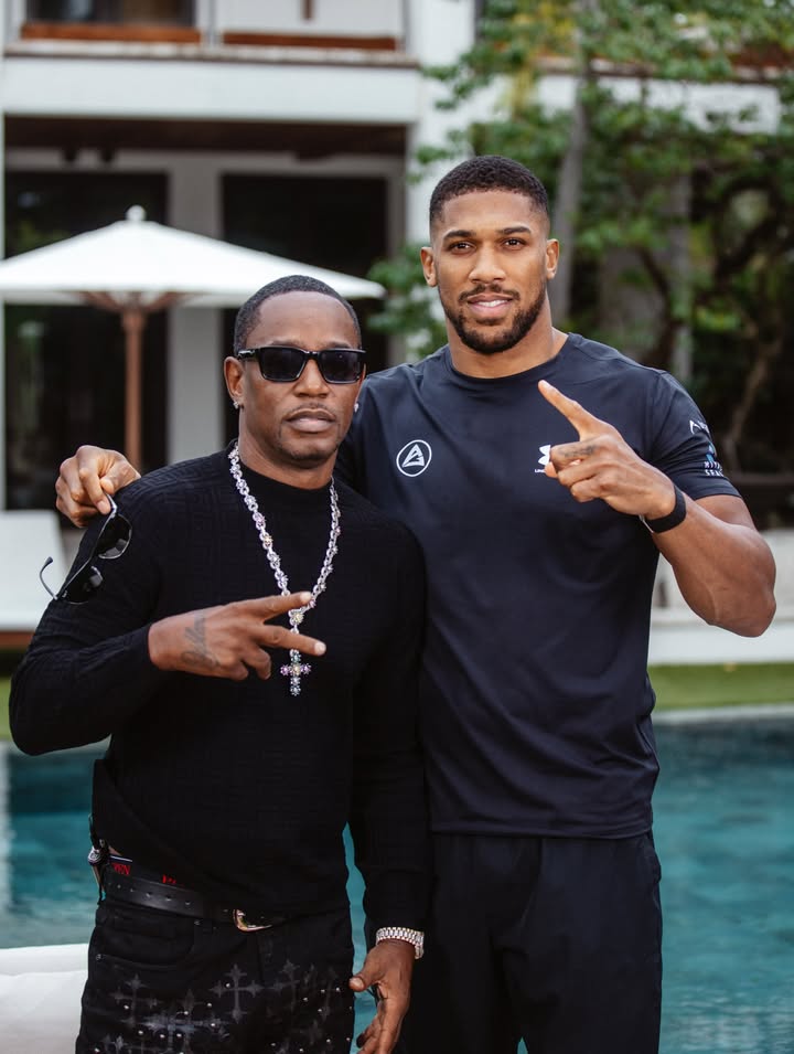 May be an image of wrist watch, sportswear and text