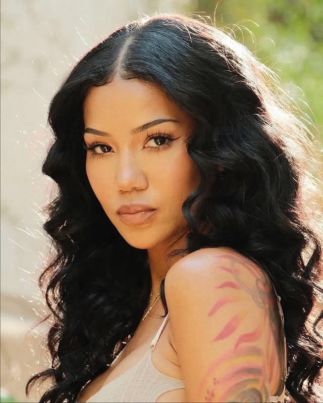 May be an image of one or more people, long hair, makeup and text