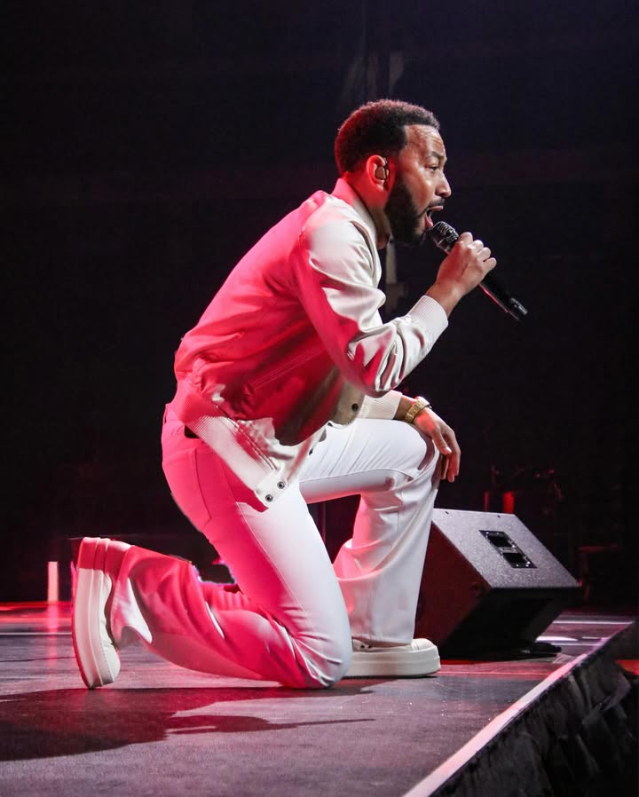 May be an image of microphone, concert and text