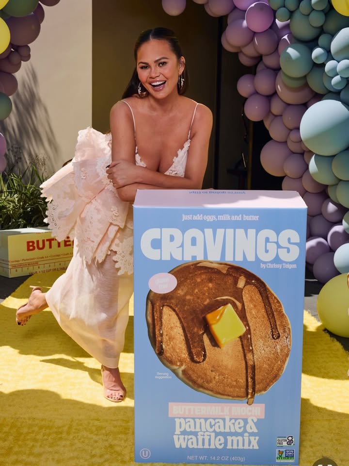 May be an image of oatmeal cookies, banner, magazine and text that says 'DEEEa DUoES Βυι just add eggs, justadieggs,mlikandbuter milk milkand butter CRAVINGS byChirissyTelgen by byChrissy Telgen สน p BUTTERMILK ЛOCH! pancake& wafflemix mix NET WT. NETWT.14.2OZ(403g) 14.2OZ(403g) CELFIED'