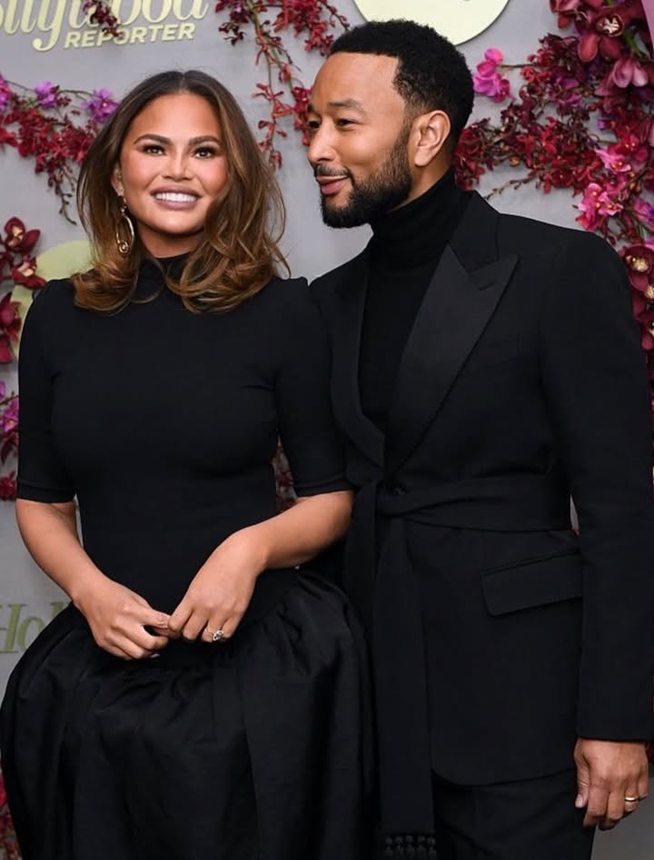 May be an image of one or more people, makeup, dinner jacket, carpet and text