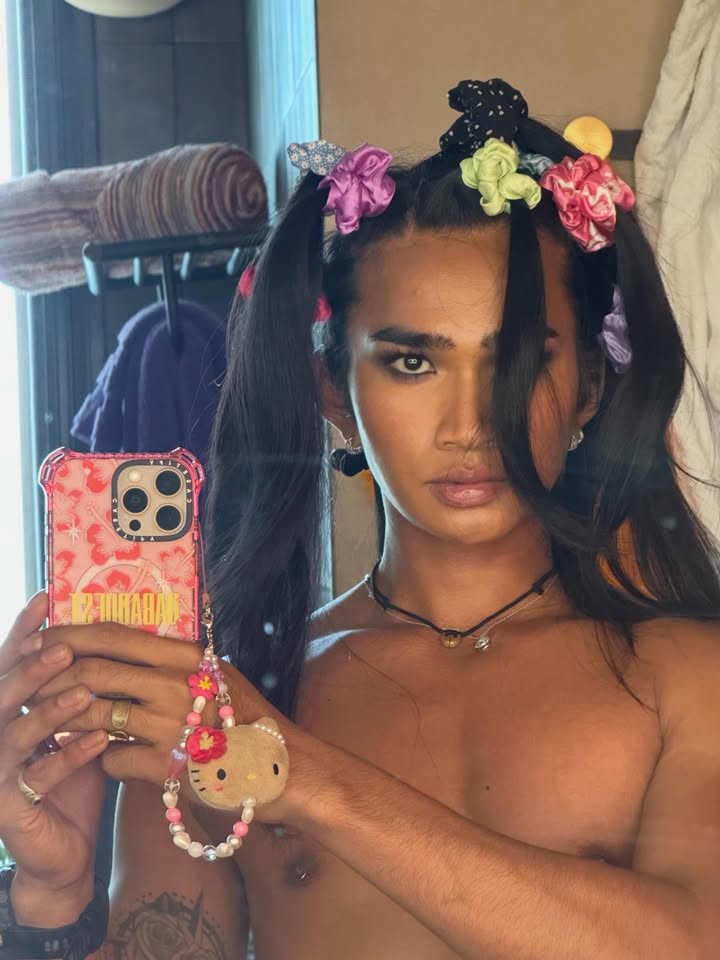 May be a selfie of one or more people, makeup, hair, phone, headdress and text