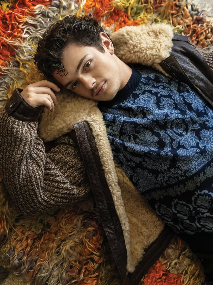 May be an image of one or more people, makeup, fur, turtleneck and text