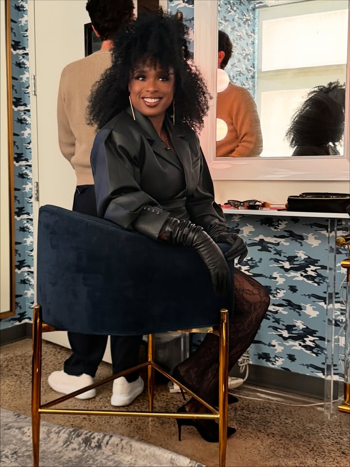 May be an image of one or more people, makeup, fur, jacket and office