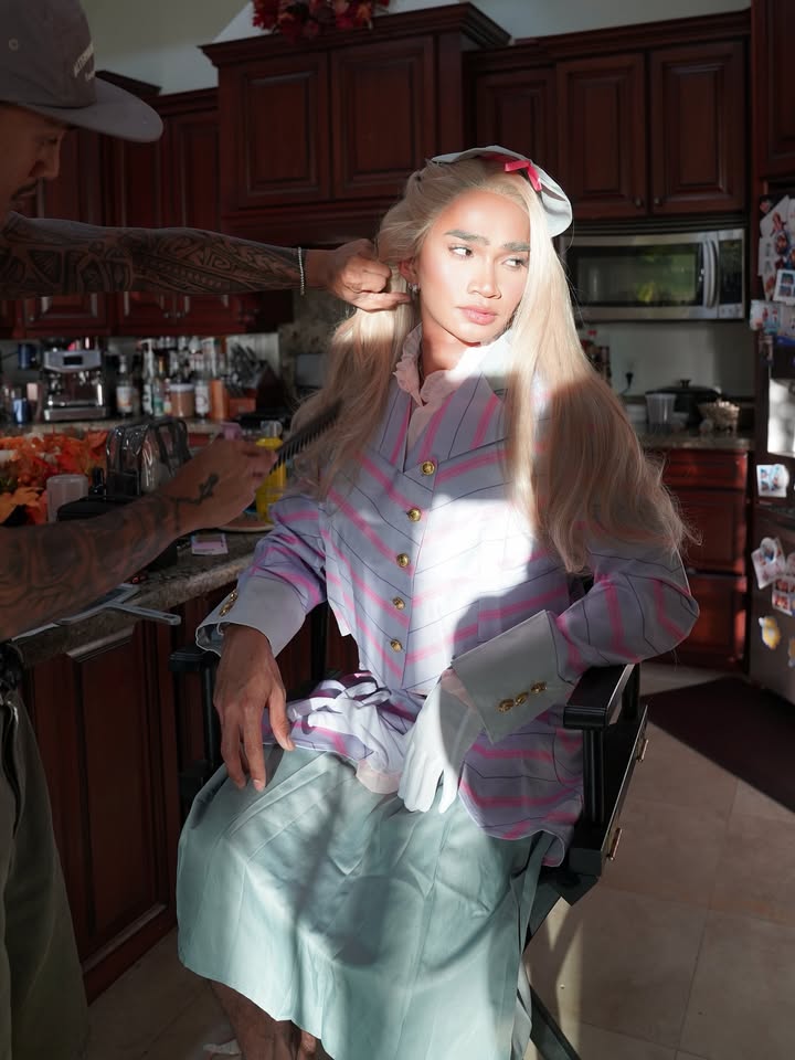 May be an image of one or more people, blonde hair and apron