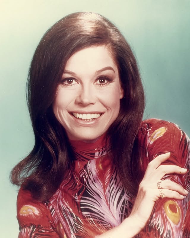 May be an image of one or more people and text