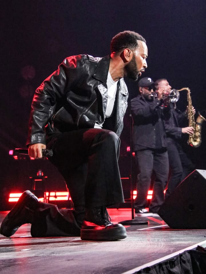 May be an image of saxophone, microphone, concert and text