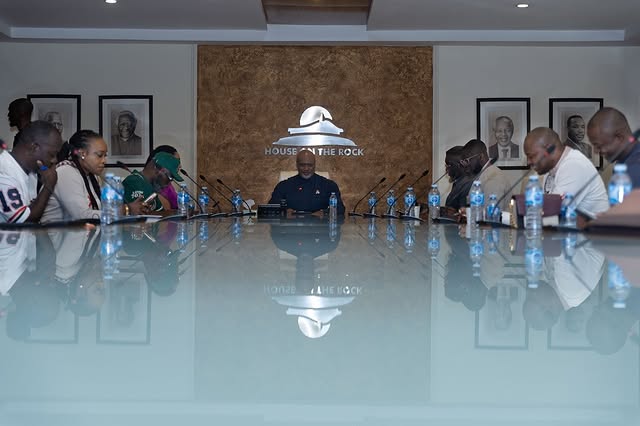 May be an image of table, lighting, office and text