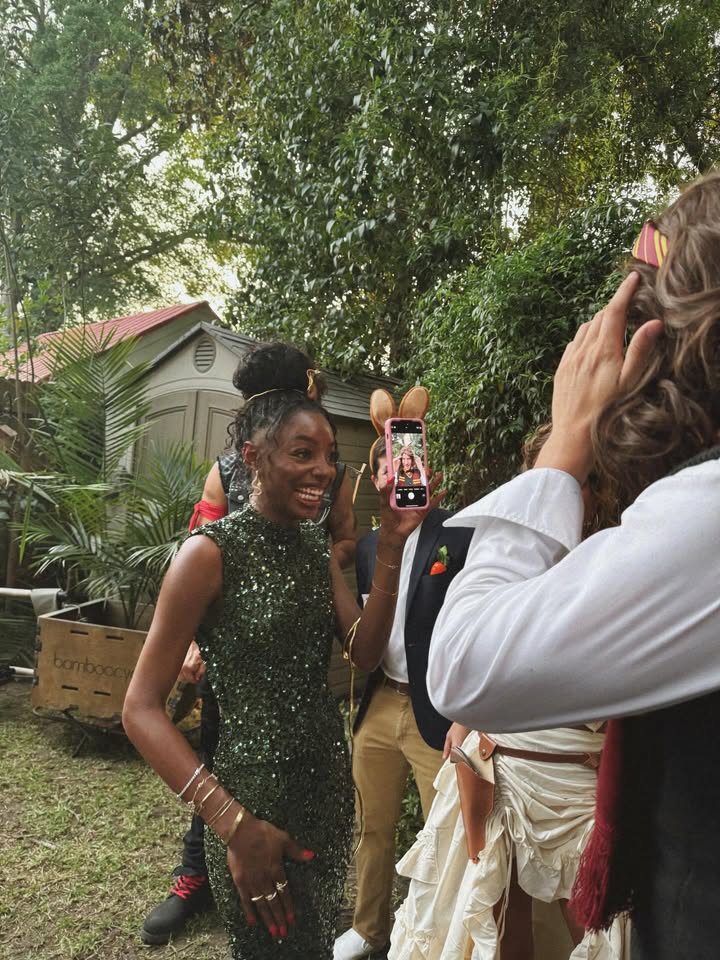 May be an image of gown, wedding and text